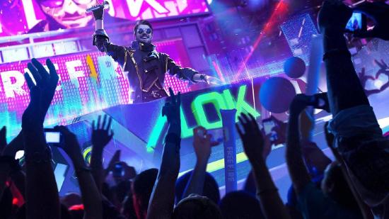 A DJ stands in front of a crowd with his arms in the air. The background is neon blue and purple, while everyone in the crowd is dancing enthusiastically
