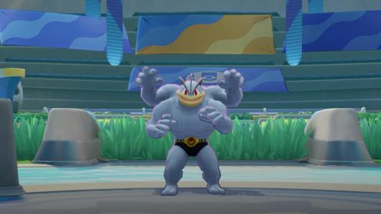 Pokémon Unite's Machamp standing in the arena