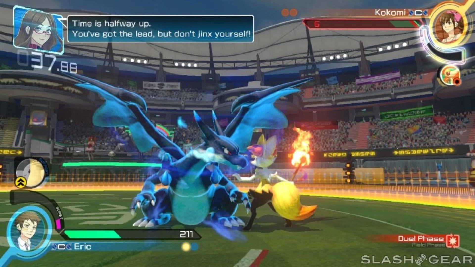 A Mega Charizard and a Braixen face off in battle