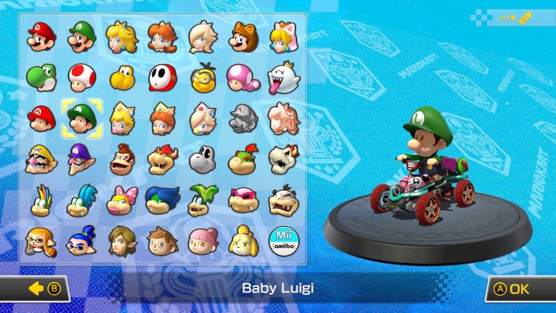 Baby Luigi is visible on a character selection screen, sitting in a kart