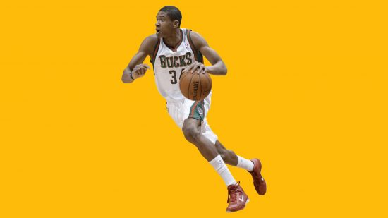 Best basketball games: key art for the game NBA 2K 2022 shows a basketball player in a white uniform, against a yellow background