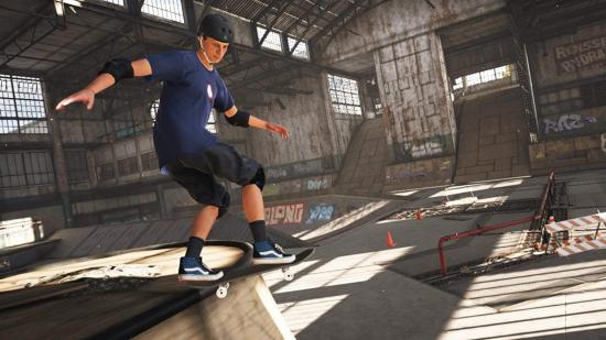 Tony Hawk grinding a ramp in the warehouse