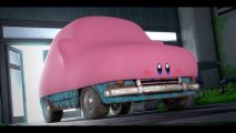 Kirby inhales a car in mouthful mode from Kirby and the Forgotten Land.