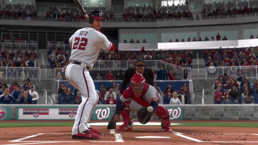 A picture of two baseball players during a baseball game in MLB The Show 22