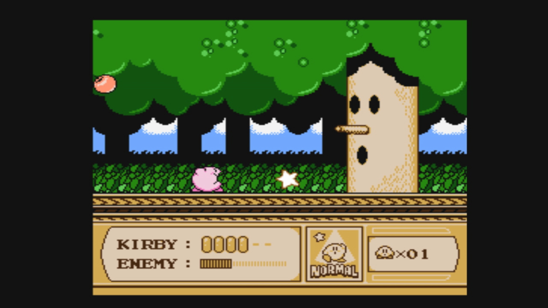 Best Kirby games: Kirby's Adventure. Image shows Kirby in a boss battle against Whispy Woods.