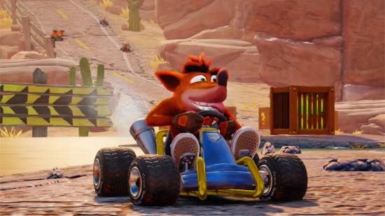 Crash driving a kart with his tongue sticking out