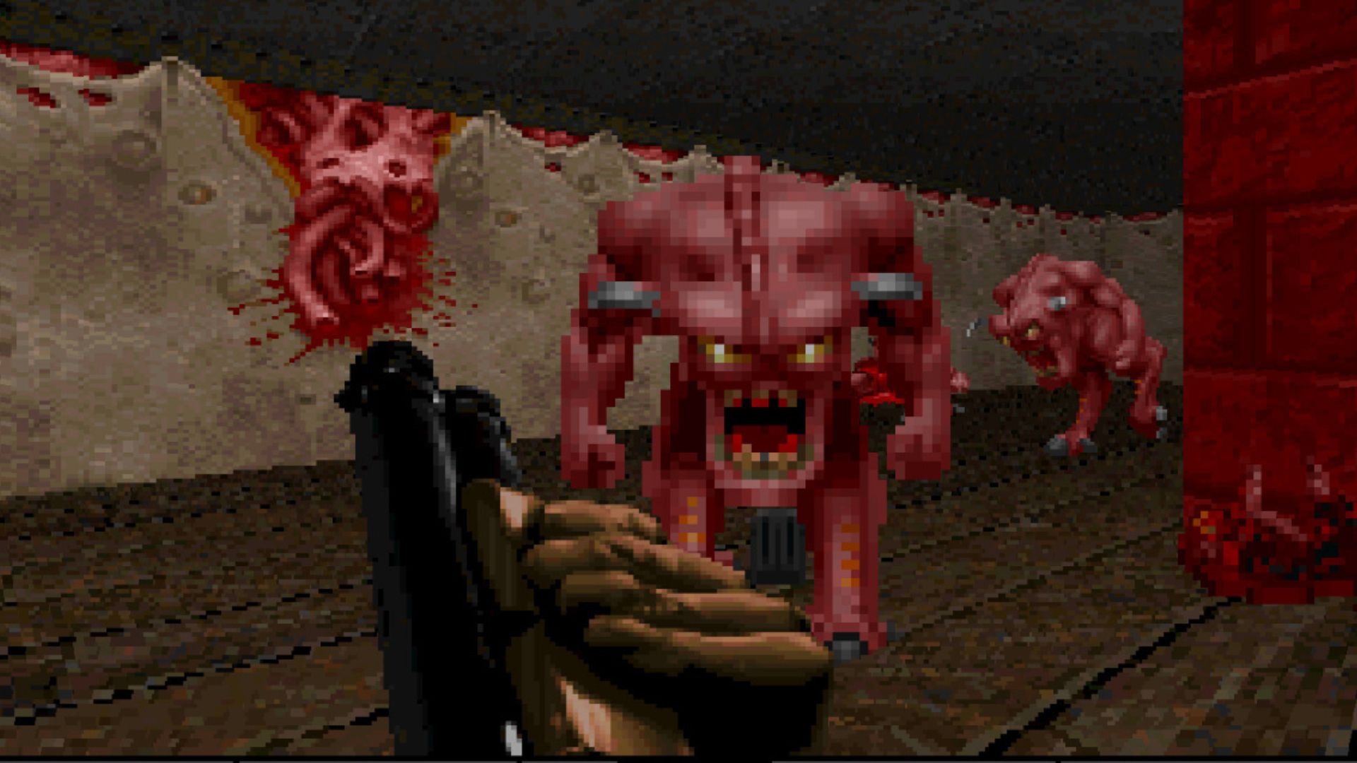 Best monster games: Doom. Image shows a red, pixely demon in the first Doom game.