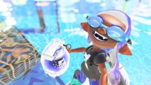 A Splatoon character with water behind them, jumping in the air and grinning, wearing goggles and holding a grenade.