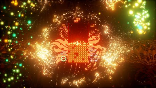 One of the many Tetris games, Tetris Effect: Connected, showing a game of Tetris with orange tetrominoes, a burst of orange pattern behind the game grid, and various yellowish sparks flying around in a circle.