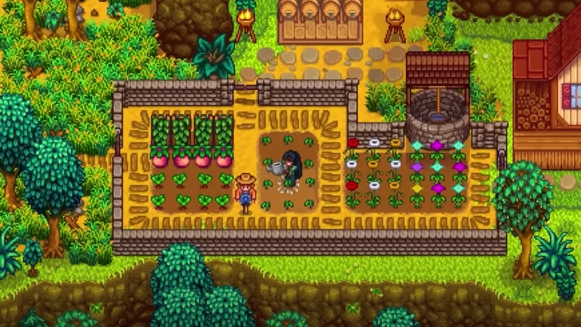 彼の作物の隣に立っている農民