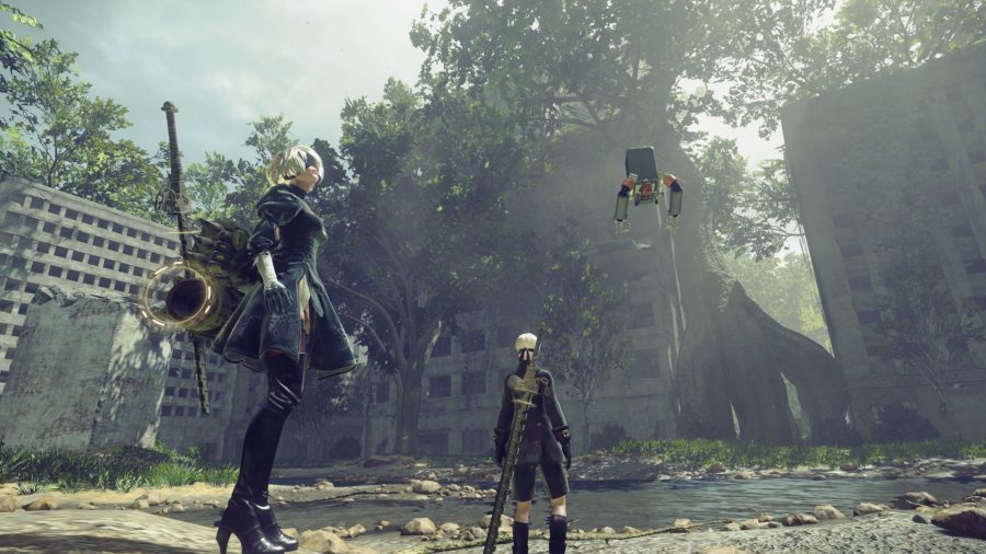 Nier Automata 9S standing with 2B and a pod, looking out at a derelict city covered in foliage.