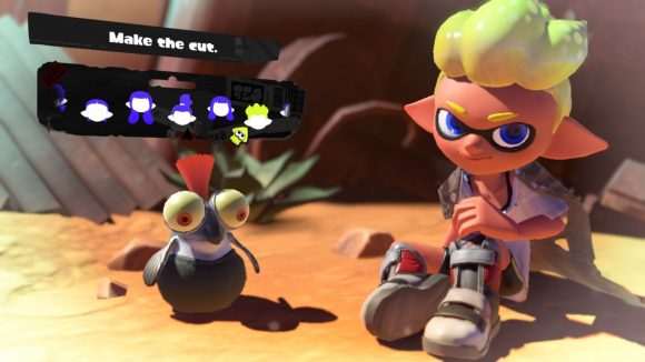 A spiky Splatoon 3 hairstyle. Shown off by a character with grey shoes, yellow hair, sat in the desert with a cliff face behind them,and a small cute fish creature with an orange tuft of hair coming out the top of their head, and the menu options for choosing the hairstyle above.