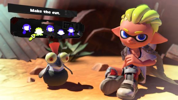 A slicked-back Splatoon 3 hairstyle. Shown off by a character with grey shoes, yellow hair, sat in the desert with a cliff face behind them,and a small cute fish creature with an orange tuft of hair coming out the top of their head, and the menu options for choosing the hairstyle above.
