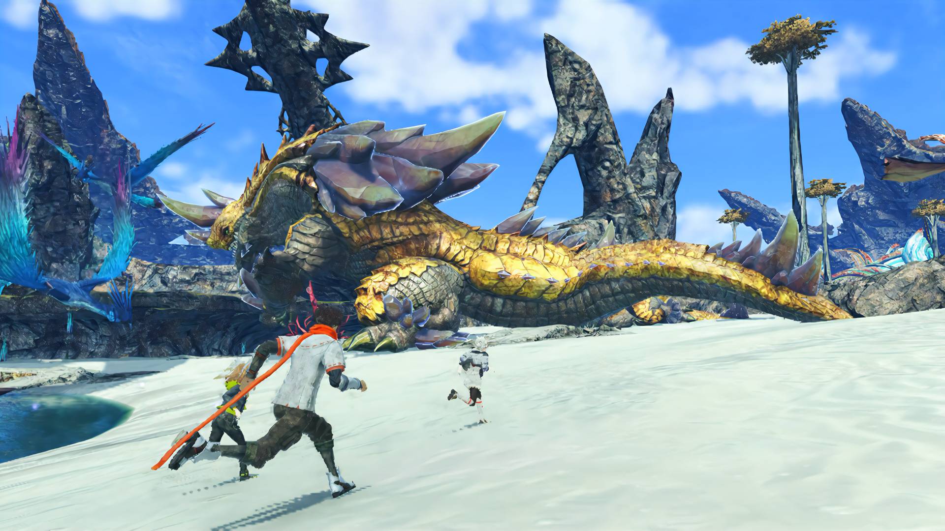 Best Switch games: a screenshot from the RPG Xenoblade Chronicles 3 shows three young JRPG protagonists running along a sandy beach. In the background, a hulking monster with large horns and scales wanders by