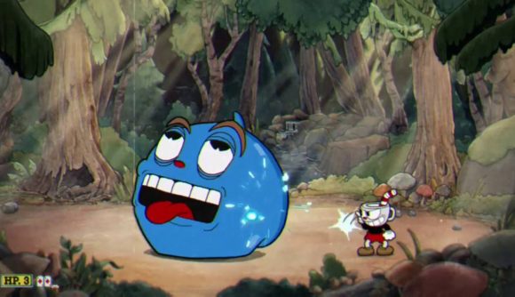 Cuphead bosses: a small red cupman attacks a giant blue blob