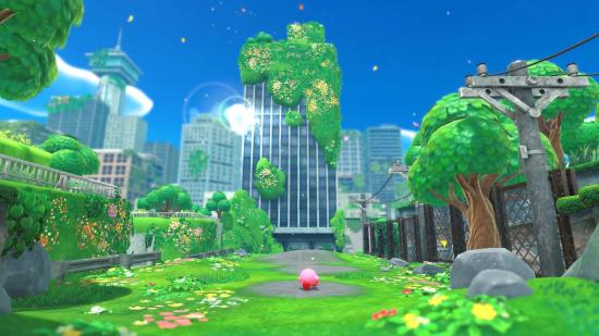 Kirby walking down a colourful yet delapidated street with trees and buildings ahead of him and a clear blue sky