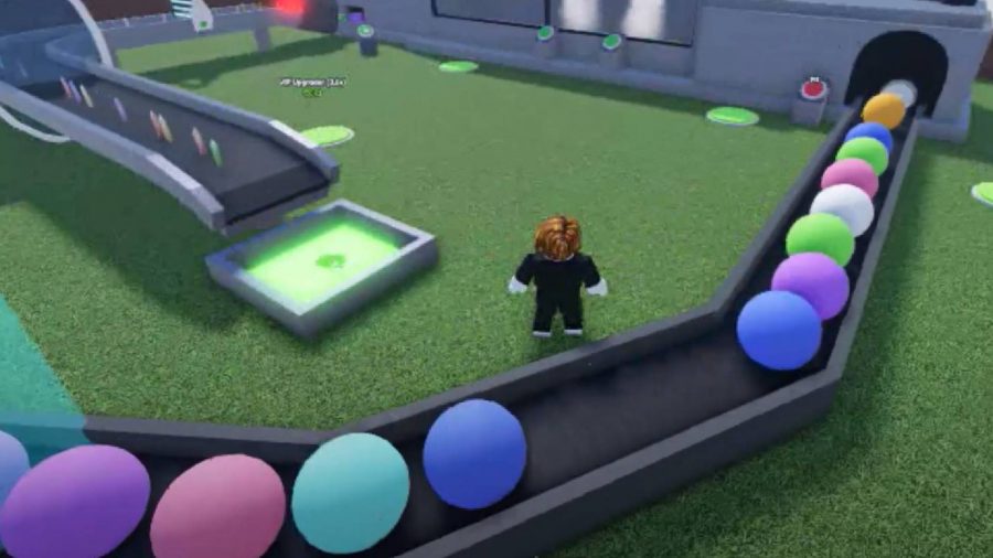 Gumball factory tycoon codes: a player character is visible in a Roblox game, with gumballs everywhere