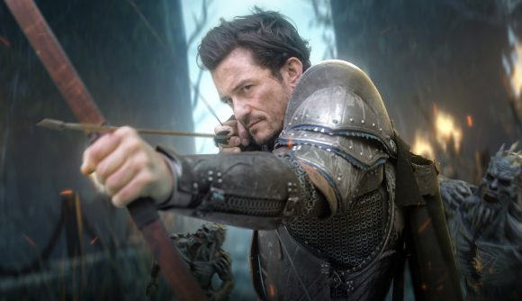 Orlando Bloom in armour shooting his bow and arrow off the screen