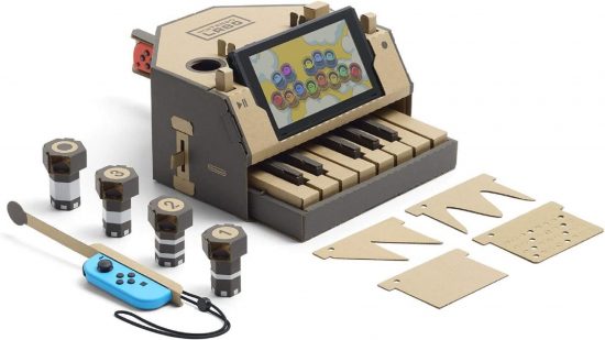 Educational games - a cardboard piano with a Nintendo Switch docked in it