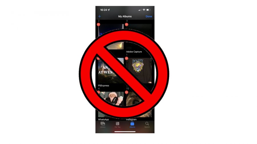 Znak bez wprowadzania nad sposobem usuwania albumów na ekranie iPhone'a przed białym tłem