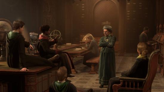 Screenshot from official Twitter prior to Hogwarts Legacy release date of students sitting in an astronomy classroom speaking to an elder teacher who is speaking with intent