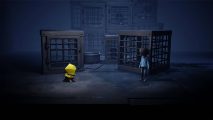 Little Nightmares Nintendo Switch sale: a screenshot from the game Little Nightmares shows a young character in a yellow coat cowering