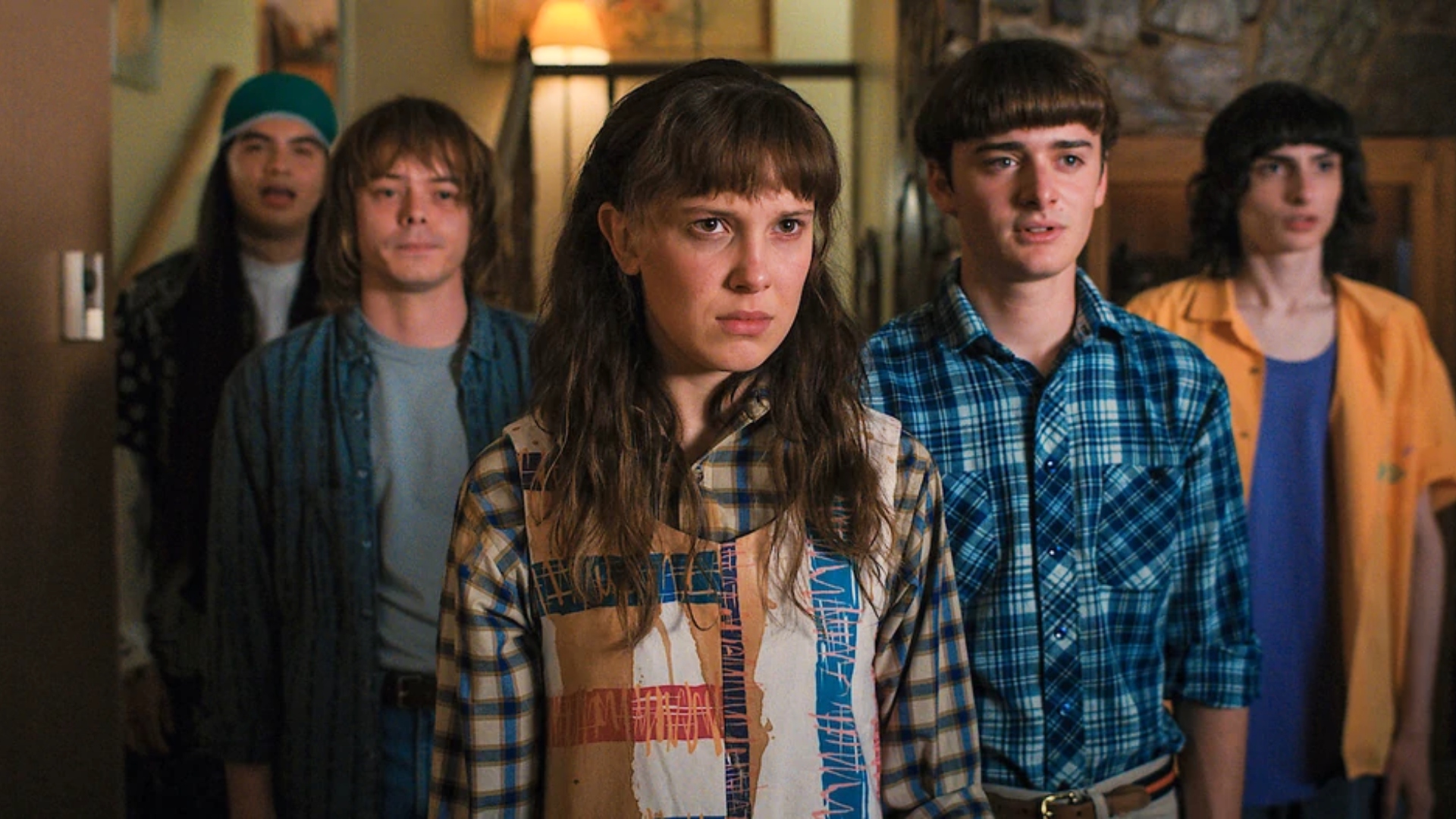 Netflix download - five Stanger Things characters stood together
