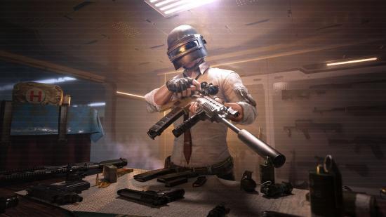 A soldier in PUBG Mobile tweaking a silenced assault rifle