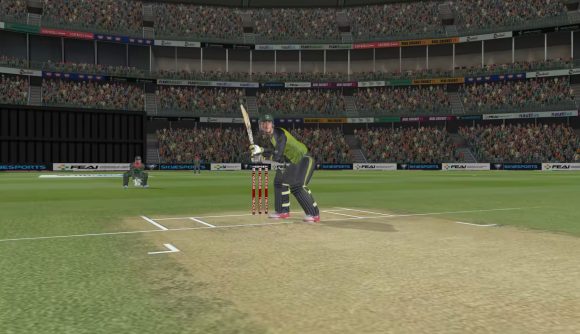 Screenshot from the Real Cricket 22 release date trailer of an Australian player preparing to hit the ball