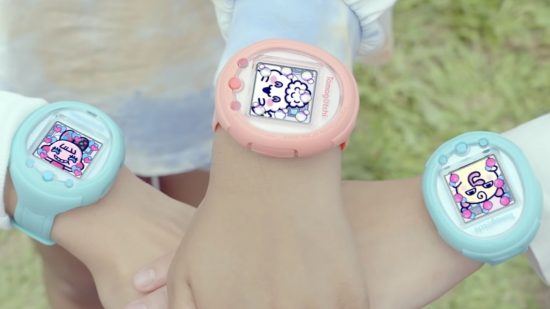 A collection of arms together each swearing a Tamagotchi Smart watch