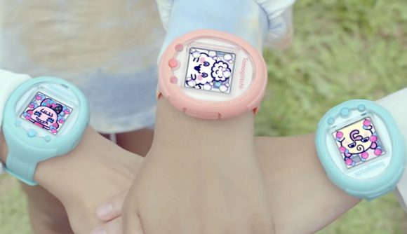 A collection of arms together each swearing a Tamagotchi Smart watch