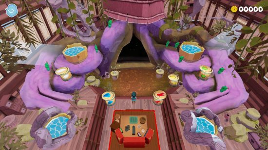 Onsen Master review - a screenshot of a level showing multiple baths surrounded by trees and woodspirits