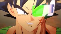 Dragon Ball Z: Kakarot - Bardock DLC release date: a screenshot from Dragon BALL Z: Kakarot shows a close of up Bardock, the saiyan father of Goku. He is wearing a scouter with a green visor, has an 'x' shaped scare on his left cheek, and is smirking menacingly