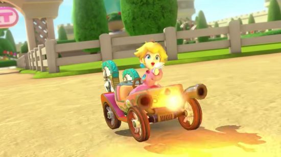 Peach, a character from the Mario series, in a go kart that is made to look like a horse drawn carriage, turning around and blowing a kiss behind her, in a screenshot from the Mario Kart 8 Wave 3 DLC.