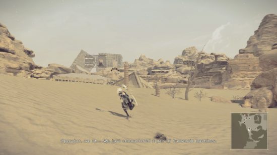 2B running across desert with rocks and dilapidated buildings in the distance in a screenshot from Nier Automata for Nintendo Switch.