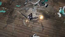 Bayonetta 3 review: a screenshot from Bayonetta 3 shows Bayonetta spinning on the floor spinning her guns