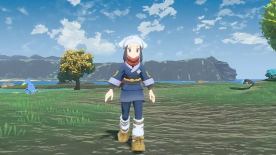 Los mejores juegos de Pokémon: captura de pantalla de Pokémon Legend Arceus que muestra a la protagonista femenina caminando por un campo