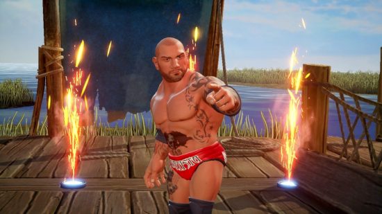 Best Wrestling Games: A picture of Dave Bautista's avatar from WWE 2K Battlegrounds pointing at the viewer.