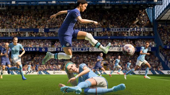 A player on the Cheese women's team jumps over a Man City women's team player slide tackling her, in a shot for FIFA 23's launch.
