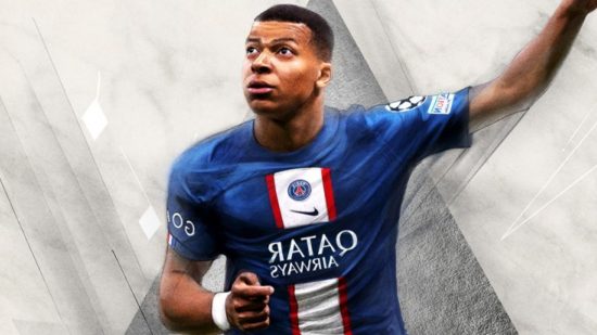 Kylian Mbappe, one hand raised, looking celebratory, below the Fifa 23 Switch legacy edition logo. He has short shaved hair and a PSG kit on.