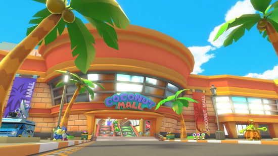 Screenshot of the front of coconut mall from Mario Kart Wii with palm tree fronds hanging overhead
