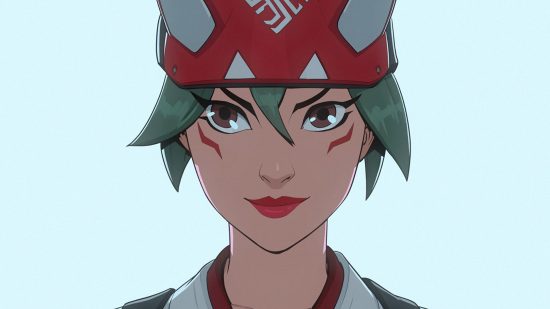 Kiriko, one the new characters with fresh Overwatch 2 voice lines. The shot is of just her hands, her slightly greenish hair poking out of a red and white fox hat. her lips are red, eyes big, with small red accents below.