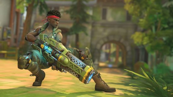 Sojourn posing with her Overwatch 2 weapon, crouching in a jungle scene with a green outfit and red headband.