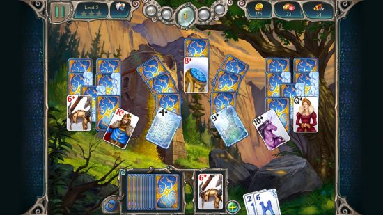 One of the many ways to play Solitaire on Switch and mobile, Avalon Legends Solitaire 2, showing various mystical cards on a background of a fantastical landscape.