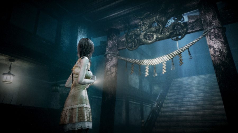 Screenshot from Project Zero Mask of the Lunar Eclipse of the main character looking up the stairs