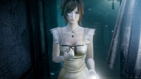 Screenshot from Project Zero Mask of the Lunar Eclipse of the main character with a torch shining at the screen