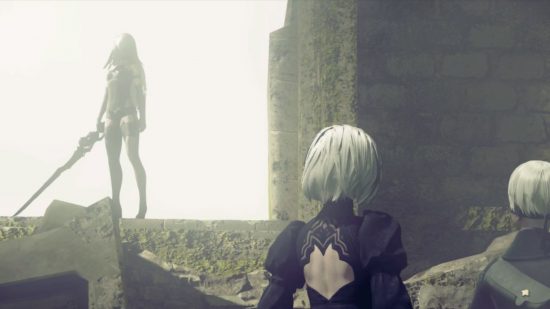 A2 from Nier Automata. She has silver hair covering half of it, bare shoulders coming out of a black bodysuit-type thing. In the foreground looking at her are 9S and 2B in a scene from Nier Automata Switch. 9S is a short haired boy-like android with a black, almost 1800s-ish outfit and a black blindfold. 2B is similarly gothic, with an ornate black dress, black hair band in silver hair, and black blindfold.