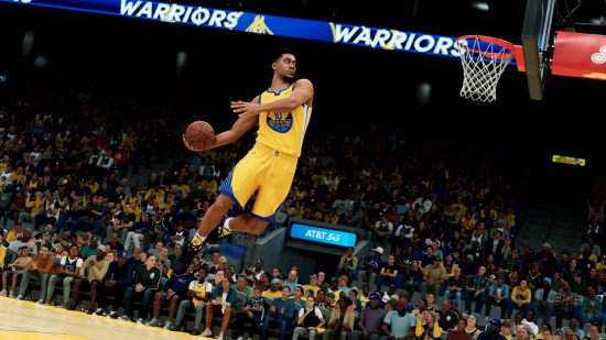 Basketball games: a screenshot from NBA 2K22 shows a player jumping through the air preparing a slam dunk
