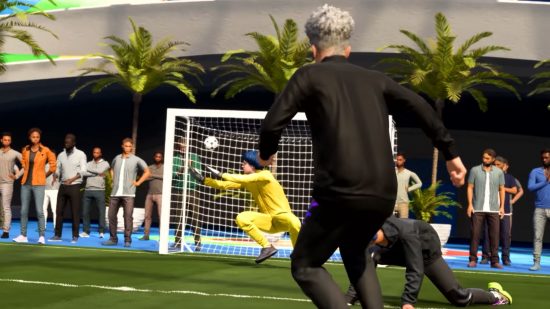 FIFA 23 Volta: a player wearing all black scores a goal in a street net, facing away, as a goalkeeper in all yellow tries to save it, and onlookers watch behind the goal by some sparse palm trees.