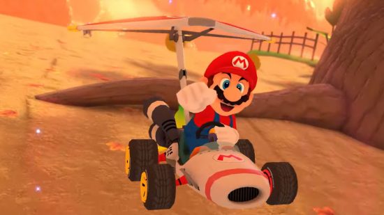 Screenshot of Mario racing through Maple Treeway in the Mario Kart DLC Wave 3 offering